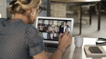 Woman in online meeting.