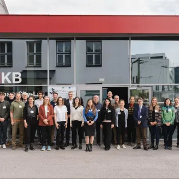 Group of people standing in front of a building