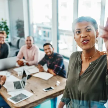 Shot of a group of young businesspeople having a brainstorming session in a modern office.