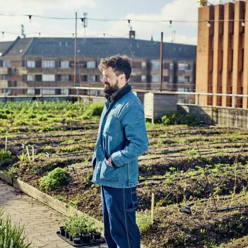 Urban farmer on a rooftop farm.