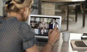 Woman in online meeting.