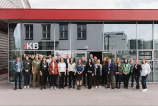 Group of people standing in front of a building