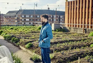 Urban farmer on a rooftop farm.