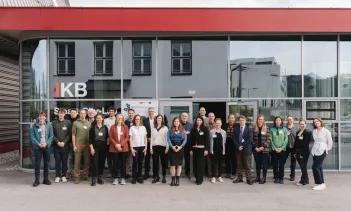 Group of people standing in front of a building